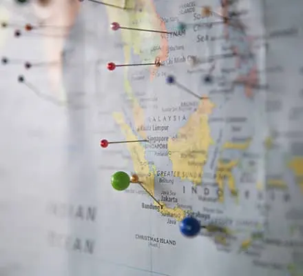 Colored pins in a map (certified professional career coach)